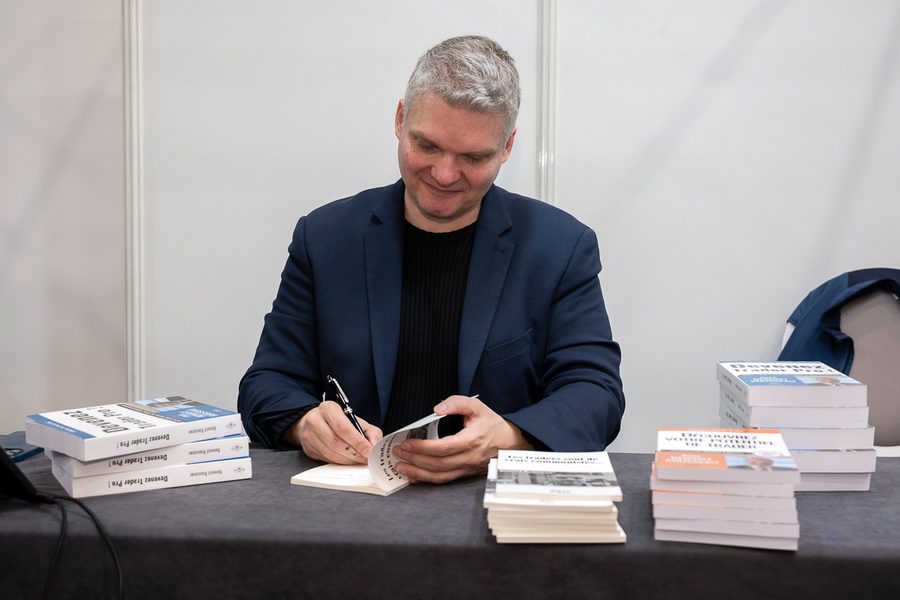 Benoist Rousseau signing his books